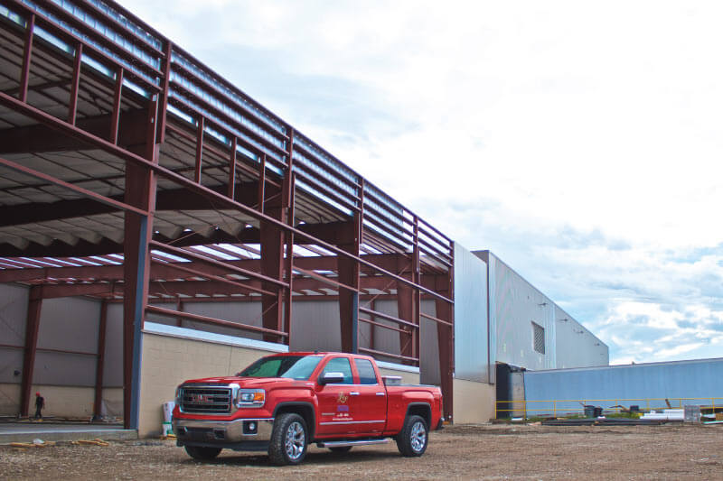 Red Lee truck outside building