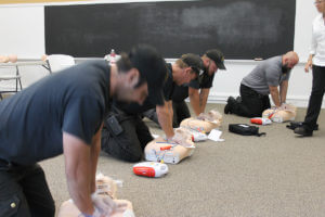 workers in cpr training