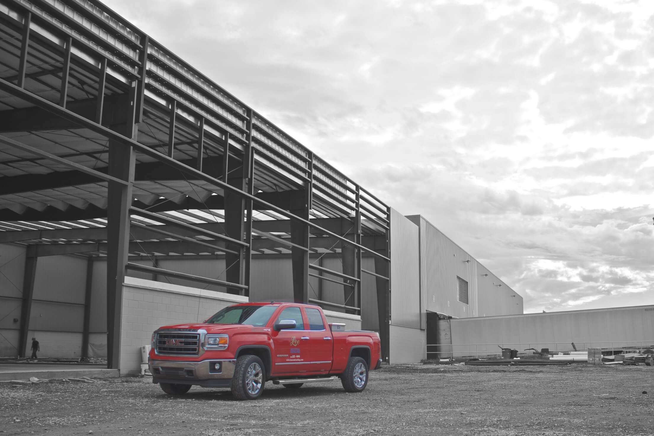 Lee truck outside facility