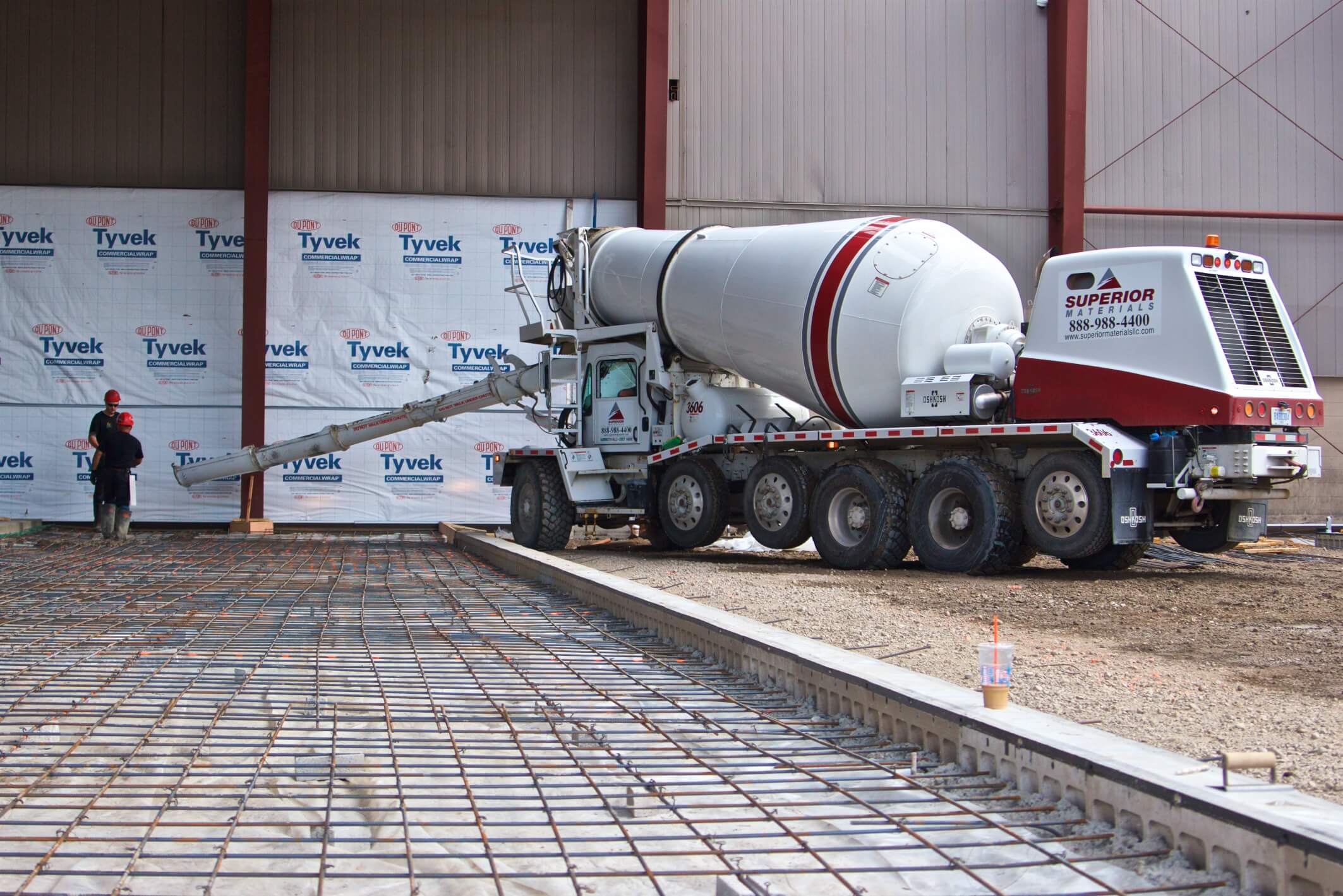 Cement truck pouring concrete mixture