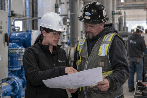 Plant Manager and Engineer looking at plans